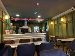 Pizzeria, Cozaio, on, Finchley, Road, is, a, charming, eatery, known, for, its, delicious, pizzas, and, welcoming, atmosphere. The, restaurant, offers, a, variety, of, traditional, and, creative, pizza, options, made, with, high-quality, ingredients, and, cooked, to, perfection. Guests, can, enjoy, a, range, of, classic, toppings, as, well, as, unique, combinations, all, prepared, in, a, cozy, and, inviting, setting. Whether, you're, craving, a, simple, margherita, or, an, adventurous, gourmet, pizza, Pizzeria, Cozaio, provides, a, delightful, dining, experience, right, on, Finchley, Road