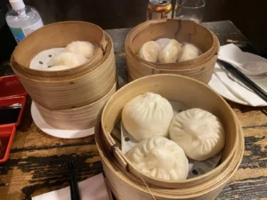 Selection of steamed dim sum served in bamboo baskets at Leong’s Legend London.