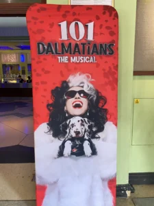 Sydnie Christmas as Cruella de Vil in 101 Dalmatians musical