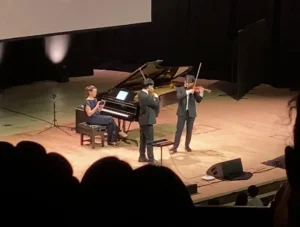 TwoSet-Violin-performing-live-on-stage-at-the-Barbican