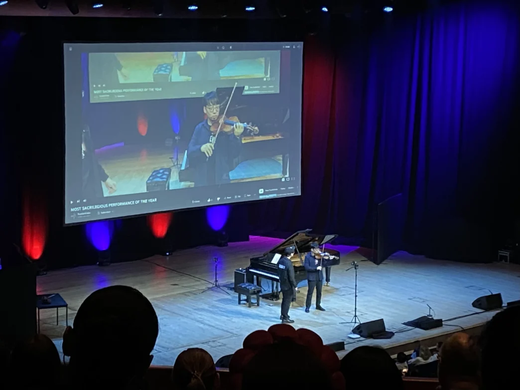 TwoSet-Violin-performing-live-on-stage-at-the-Barbican