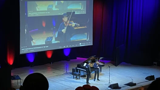 TwoSet-Violin-performing-live-on-stage-at-the-Barbican