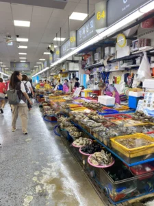 Seafood stalls inside Jagalchi Market in Busan Shellfish