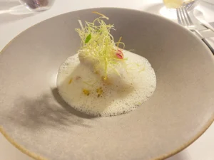 Plated seafood course from the Tribute tasting menu at IN Diferente