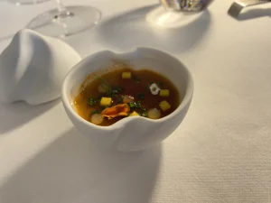 Seafood course with broth from the IN Diferente Tribute menu