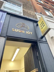 Sushi Joy shopfront on Little Newport Street in Chinatown
