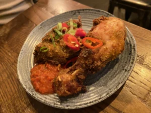 Ayam goreng berempah with sambal at Roti King Euston
