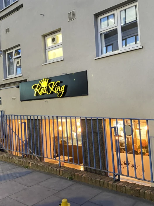 Step 10 — add alt text to all five images: Featured exterior: Entrance to Roti King Euston on Doric Way in London