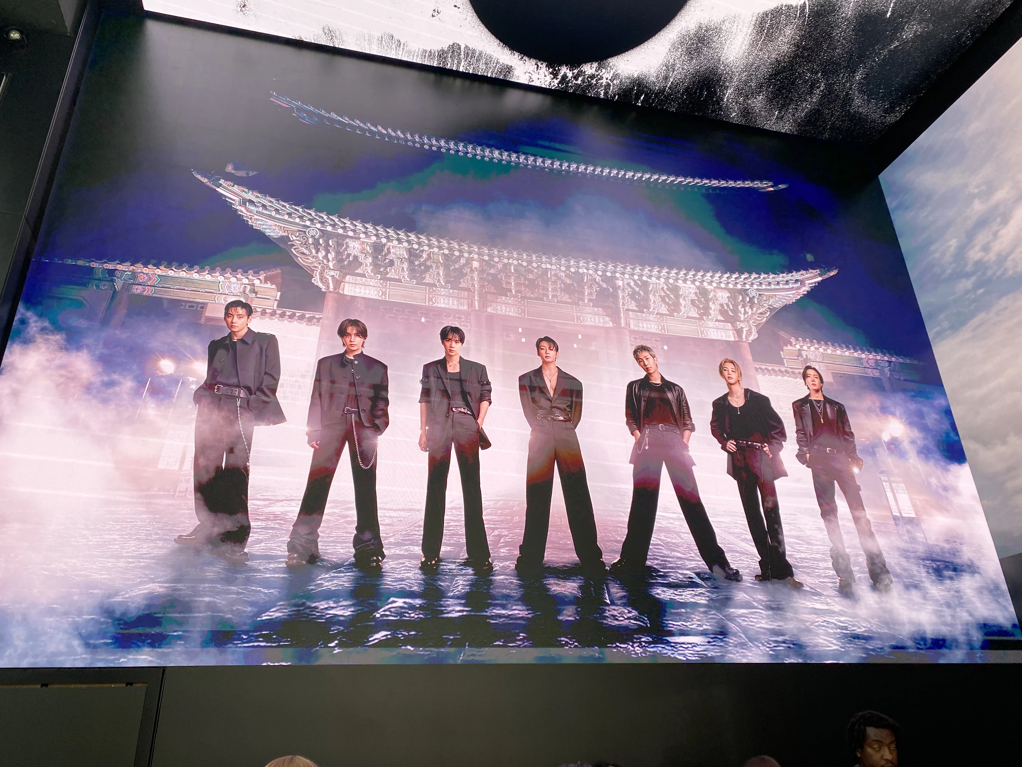 BTS POP UP LONDON 2026. 2 BTS members displayed inside the ARIRANG pop-up in London