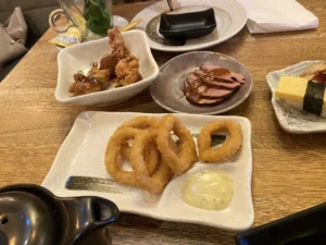 Selection of fried appetisers and dipping sauces at Miso Sushi Rotterdam Plaza