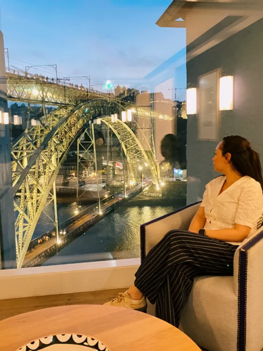 Dinner beside a panoramic window overlooking Dom Luís I Bridge at Ponte de Ferro Restaurant