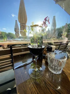 Glass of Douro red wine overlooking the Lake House terrace